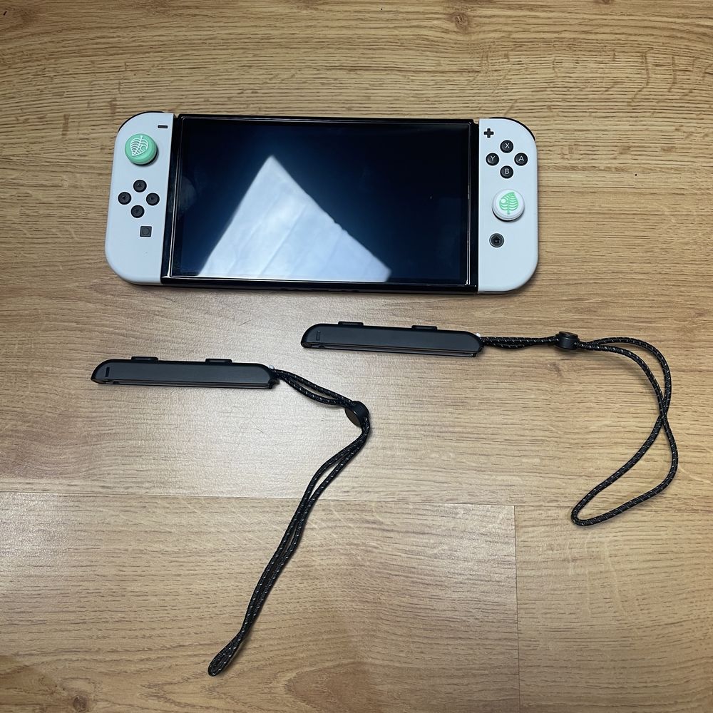 Nintendo Switch OLED + Pro Controller