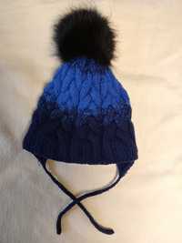 Зимняя шапка с бумбоном из натурального меха