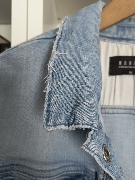 Jeansowa kurtka z przetarciami