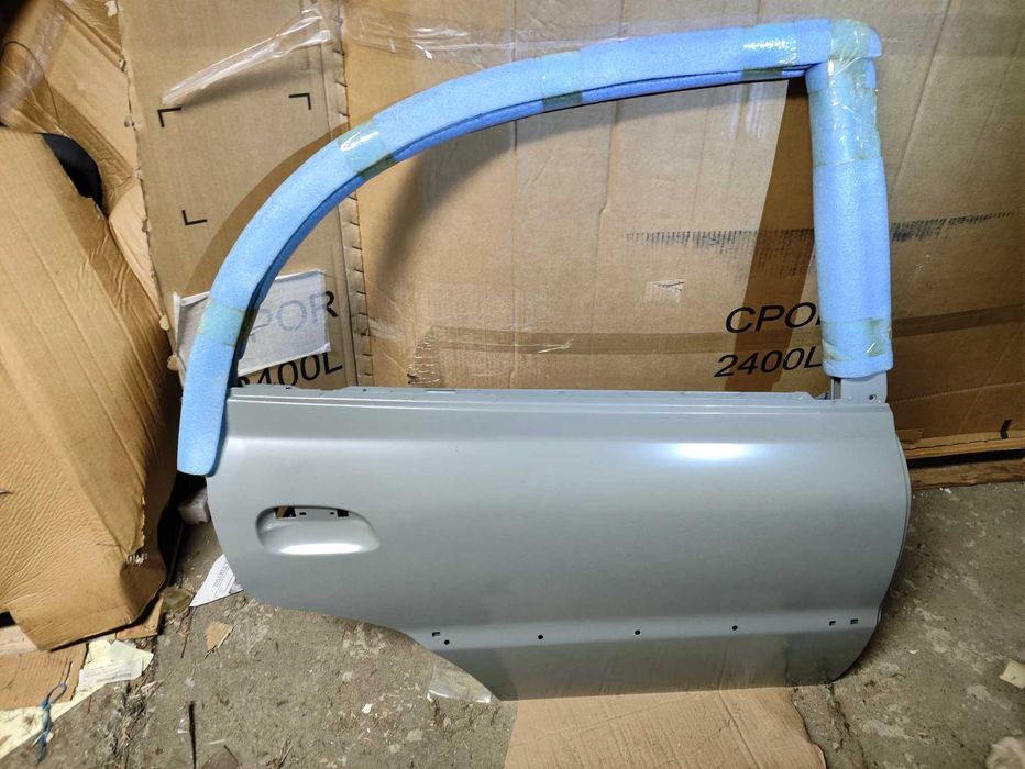Drzwi prawy tył prawe tylne Kia Rio I 01-05 OEM NOWE sedan