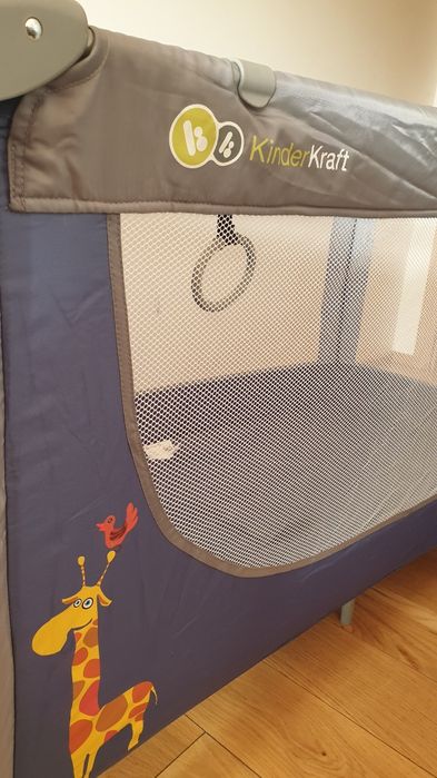 Łóżeczko KinderKraft Joy z siatką zmniejszjacą głębokość