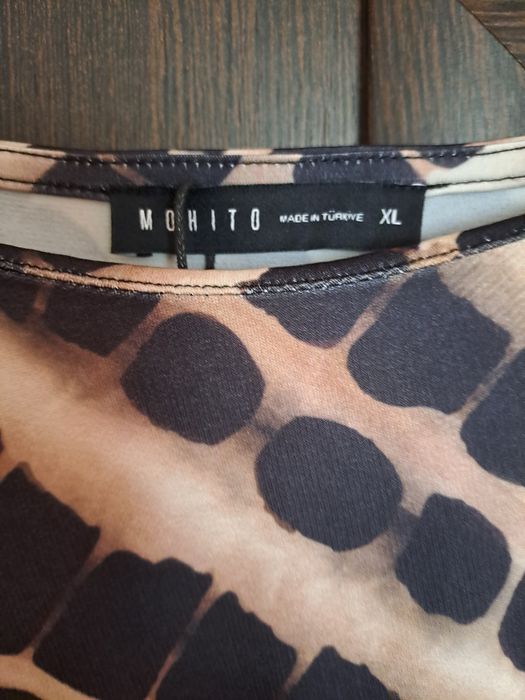 Sukienka , dół  sukienki po skosie