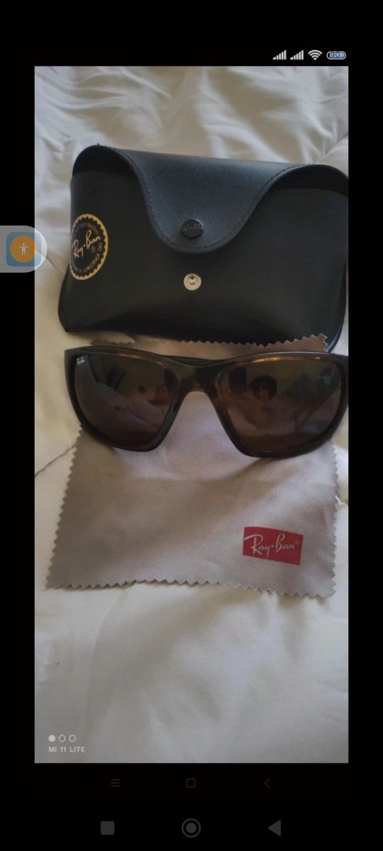 Óculos Ray-Ban ,usados,mas em estado.