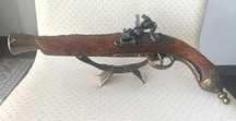 Pistola antiga de decoração e coleção