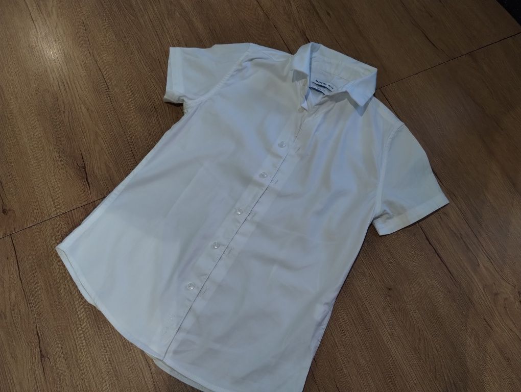 Elegancka koszula z krótkim rękawem 140