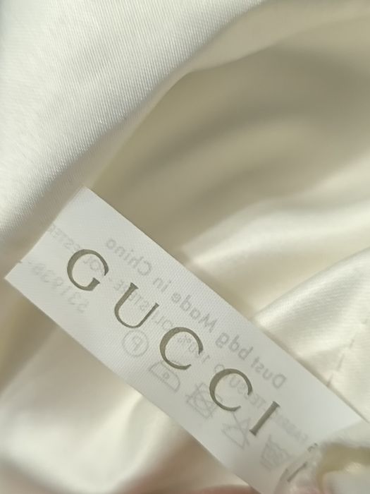 Пильник фірми Gucci