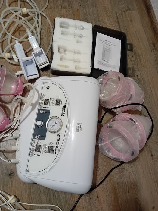 Апарат вакуумно-роликового масажу для обличчя і тіла