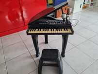 Piano de cauda de Criança
