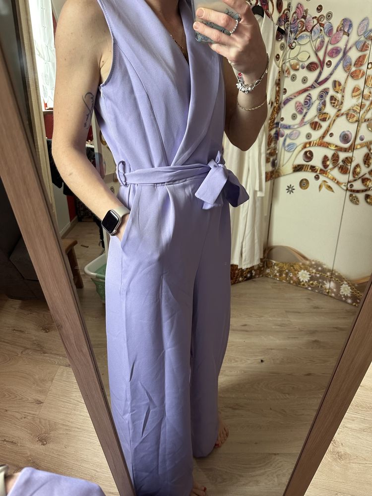 Elegancki kombinezon damski z szeroką nogawką