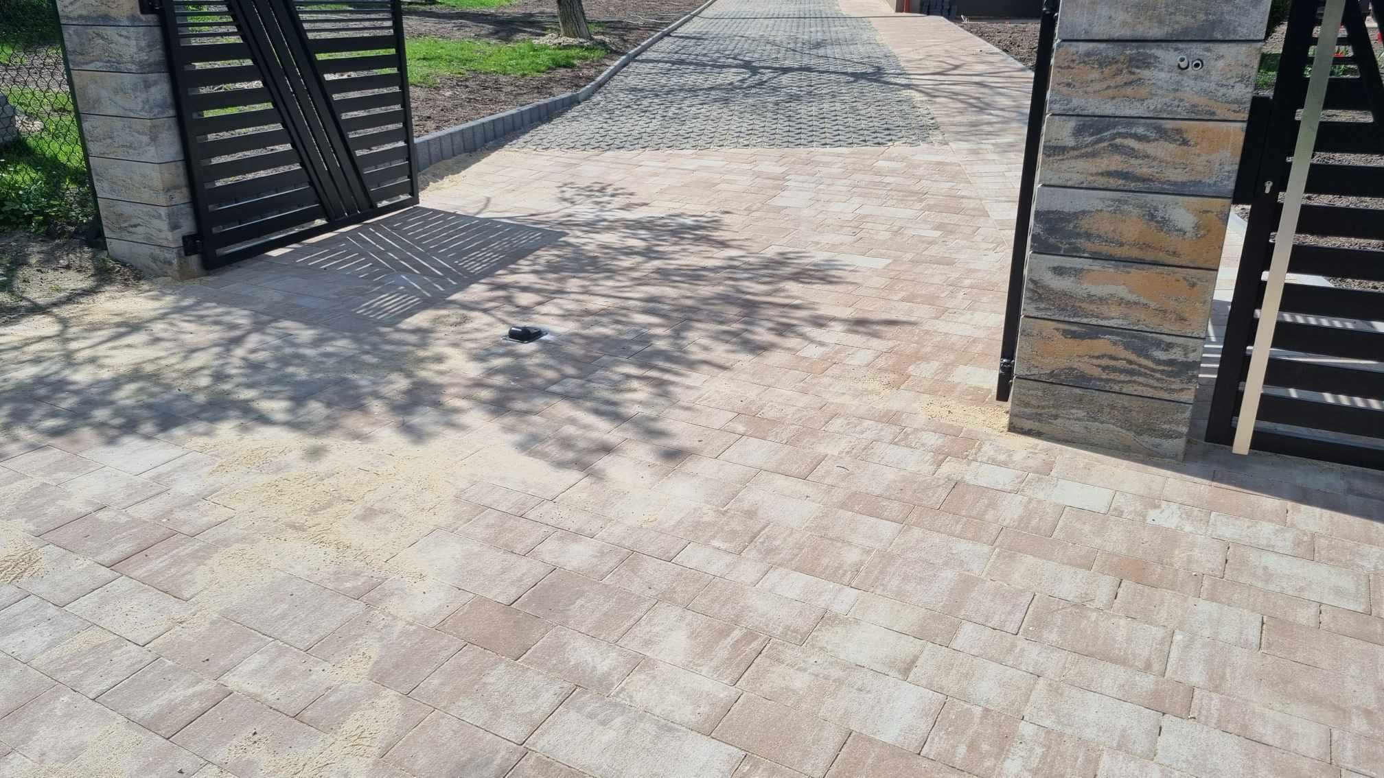 Kompleksowe ukladanie kostki brukowej .