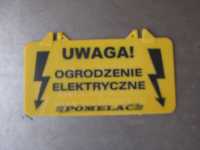 tabliczka uwaga urządzenie elektryczne