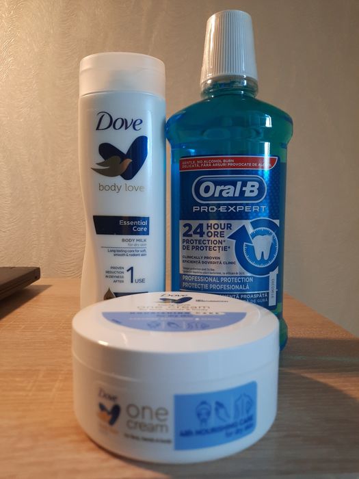 Крем та молочко для тіла Dove, та ополіскувач Oral-B
