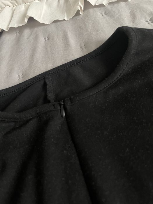 Czarny kombinezon damski jesienny