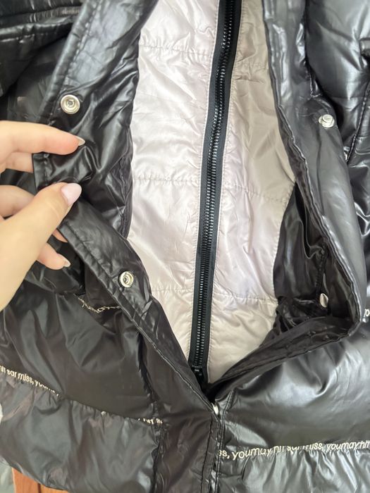 Теплюща зимова куртка