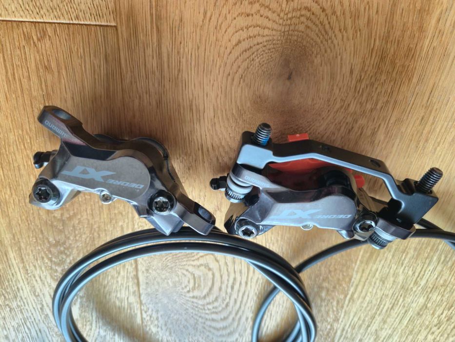 Hamulce 4 tłoczki Shimano Deore XT BL-M8100 / BR-M8120 metaliczne