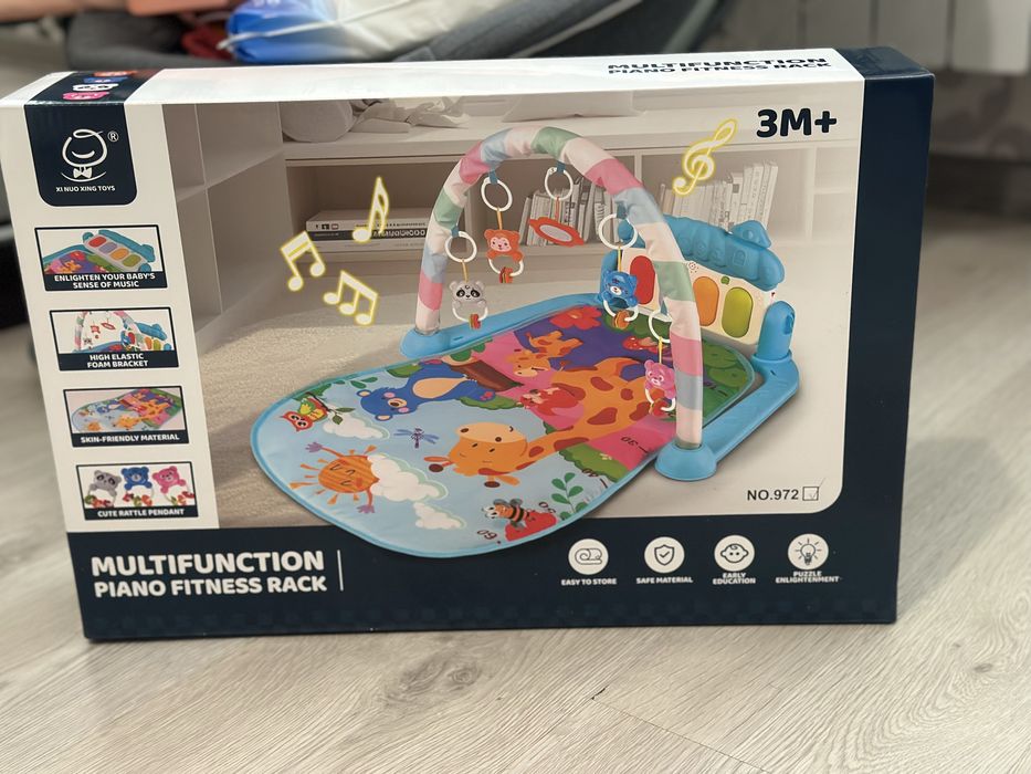 Розвиваючий килимок для малюка