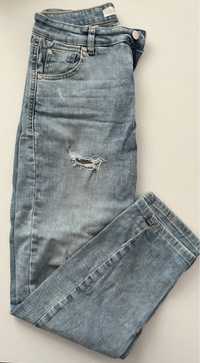 Damskie spodnie jeansy denim z rozdarciem skinny XS Reserved