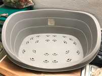 Cama de gato ou cão pequeno. Cinzento