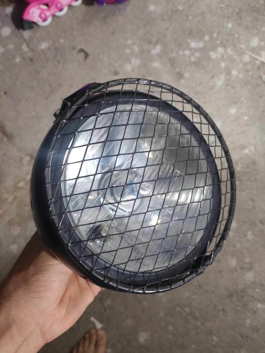 Farol grelha proteção