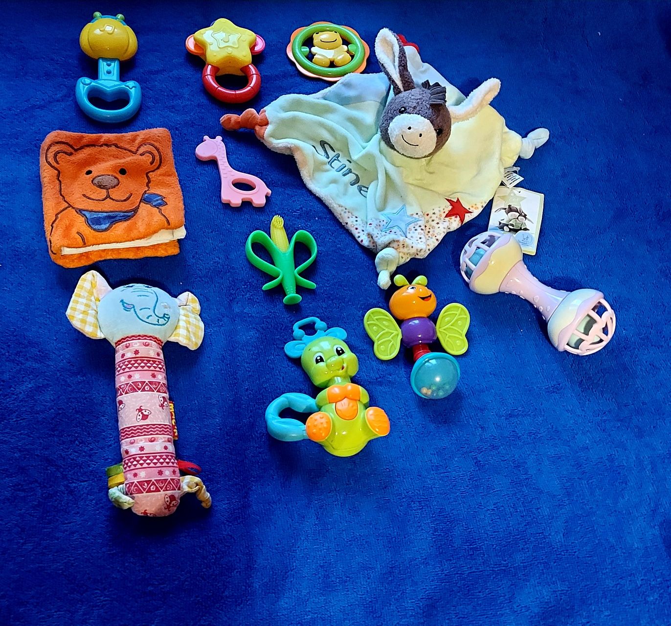 Дитячі іграшки (брязкальця,піщалки,гризунці))
