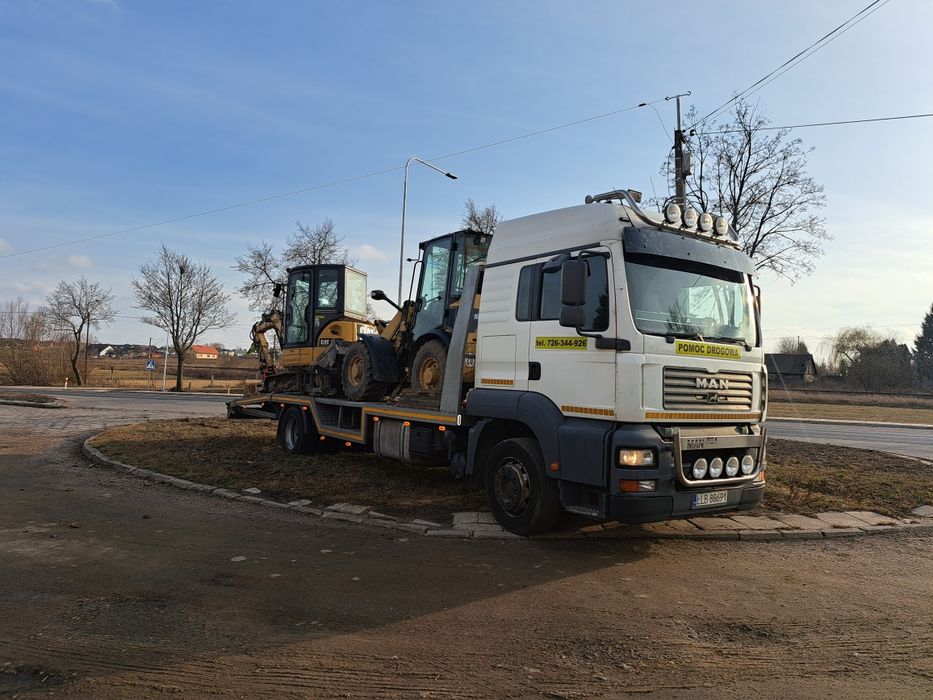 Pomoc drogowa Michòw laweta transport usługi holowanie 24h