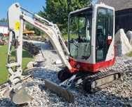 Wynajem minikoparki Takeuchi TB216