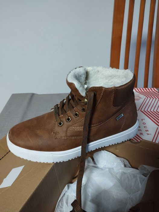 Bota em ótimo estado para rapaz