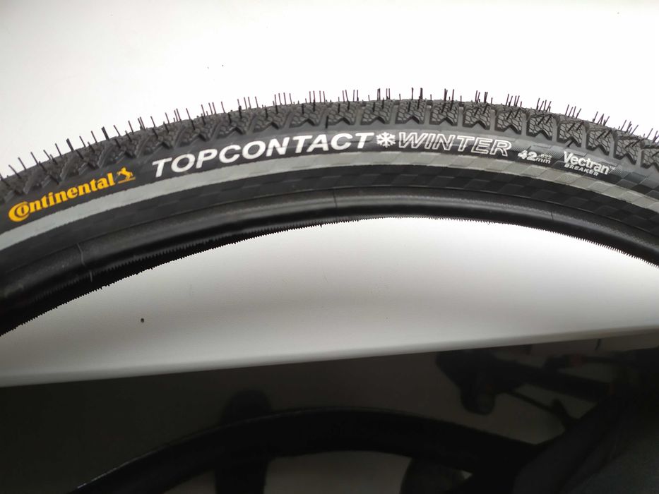 Зимние Велопокрышки Continental Top Contact Winter 700*42