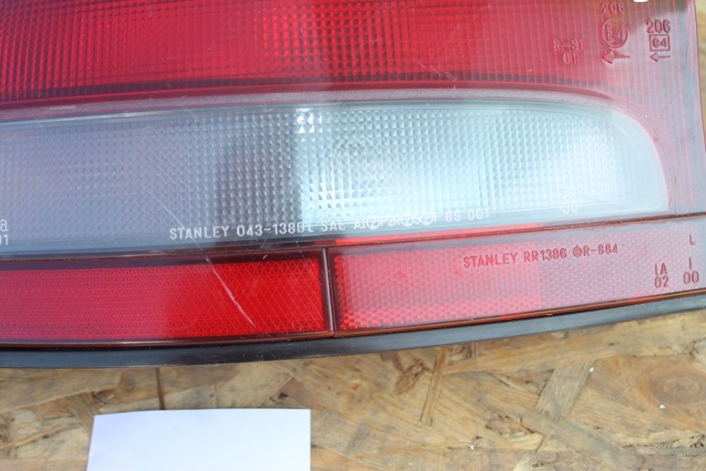 MAZDA 323 lampa tył lewa