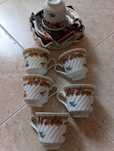 6 Chávenas de café com 6 pires muito bonitos.