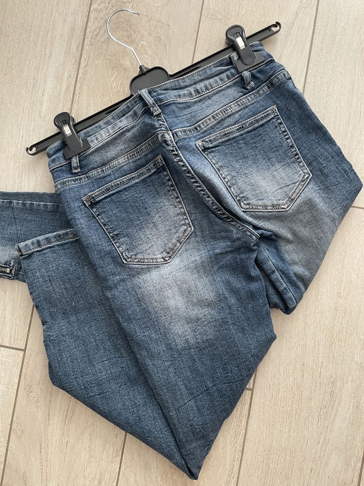 Spodnie rurki skinny średni stan jeansy dżinsy dziury przetarcia