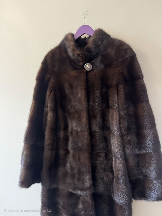 Норкова шуба шоколадного кольору