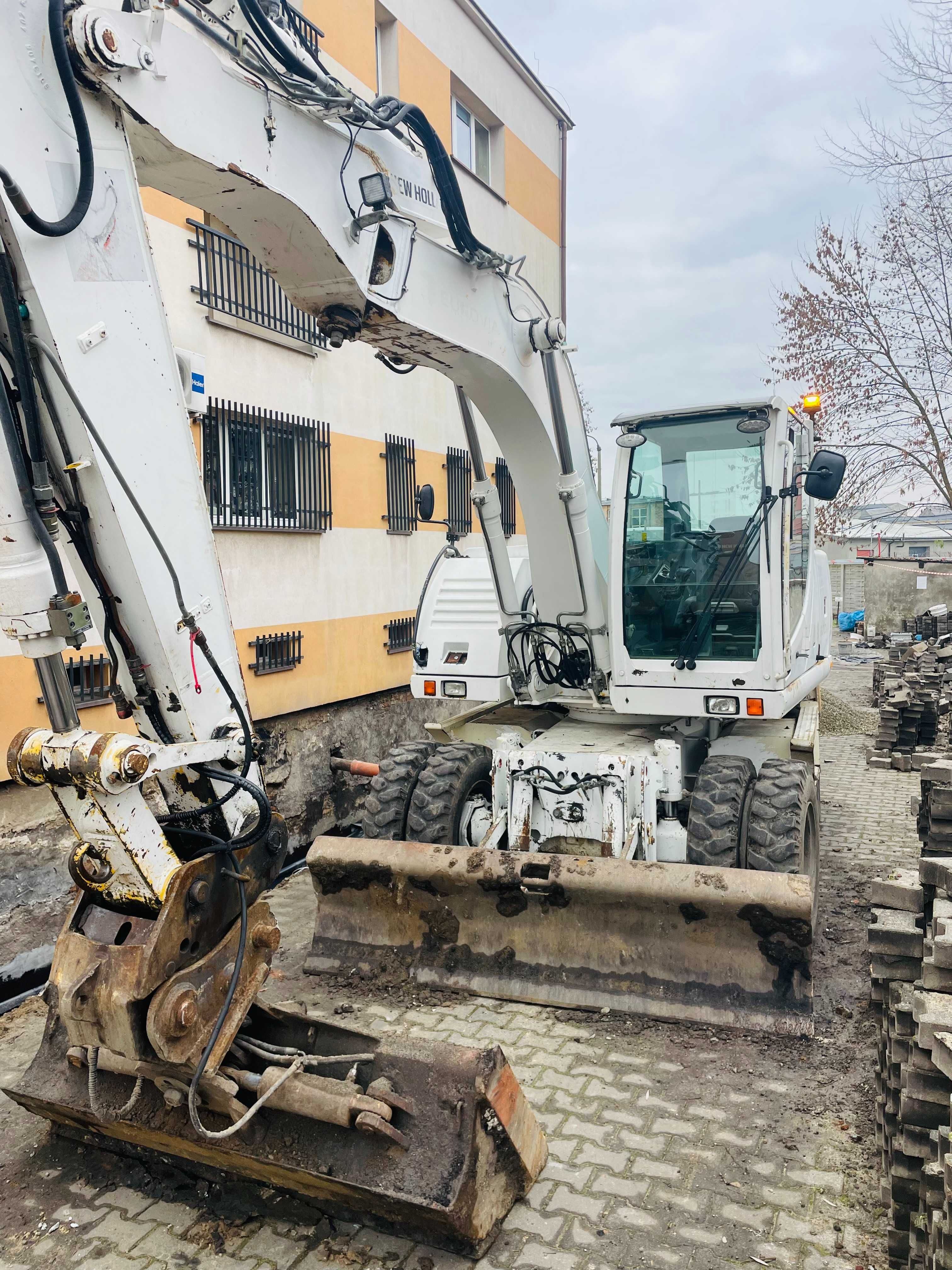 Usługi koparką obrotową, koparka kołowa wykopy wyburzenia prace ziemne