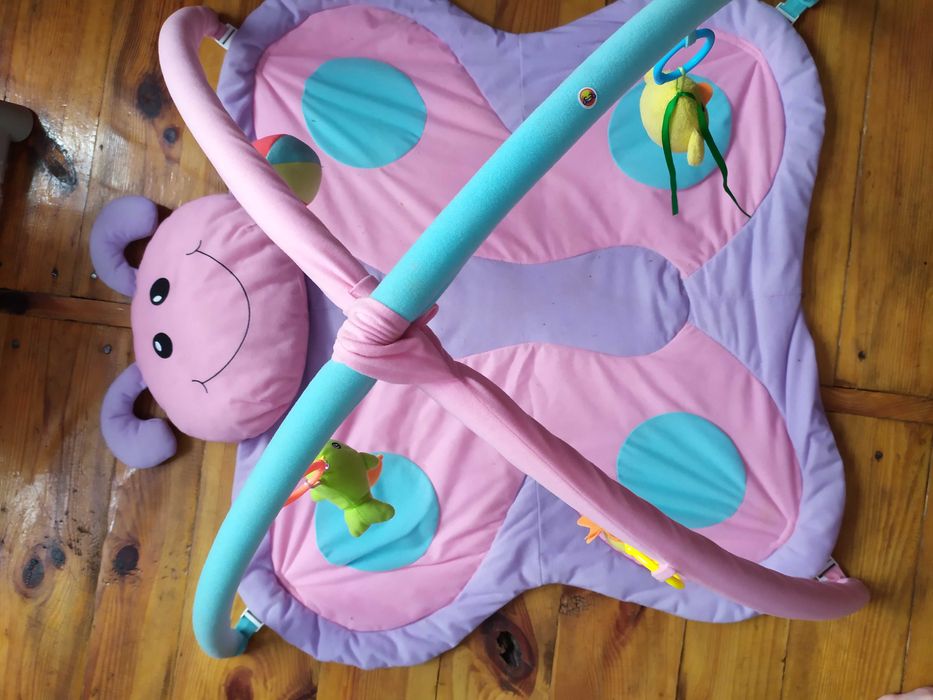 Розвиваючий коврик стан ідеальний.Практичний в використанні