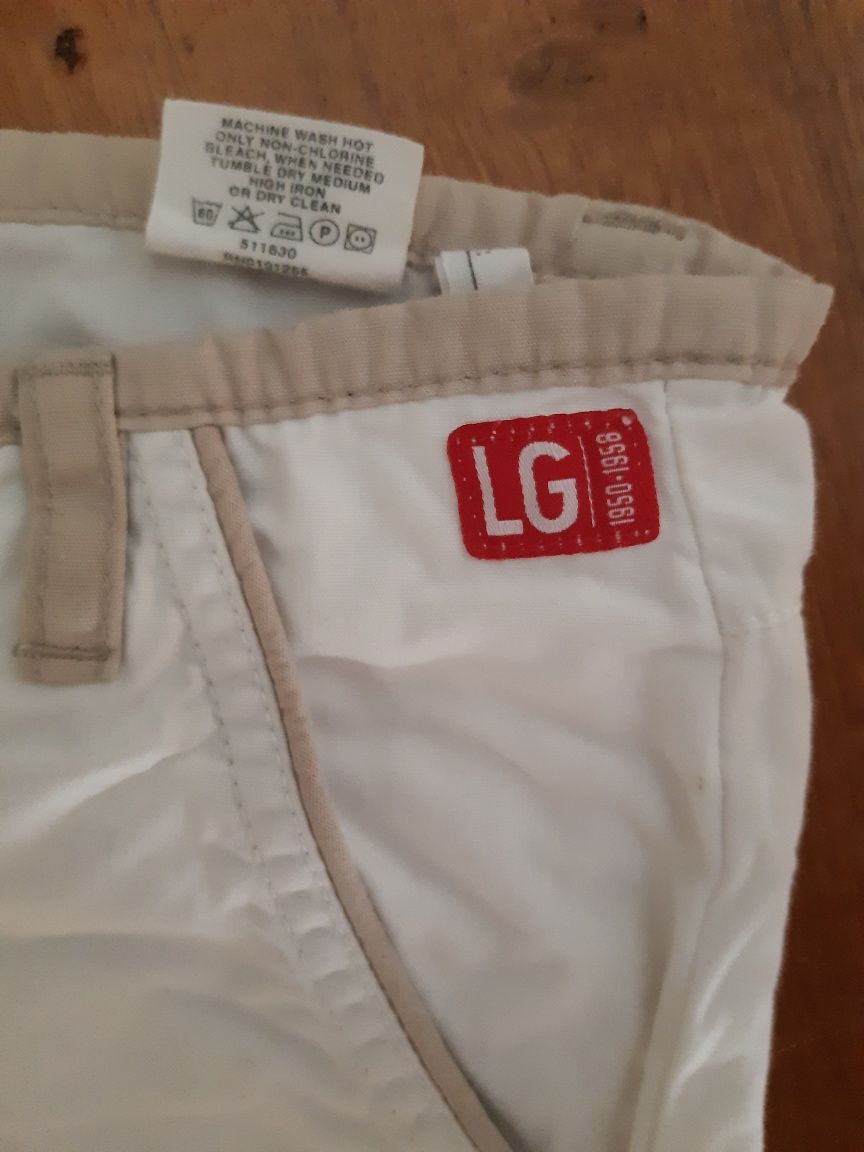 H & M urocze i stylowe, białe spodnie cotton extra ideał r 8-9 l i 134