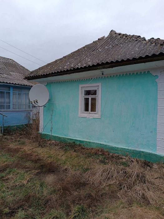 Хата з гоподарчими прибудовами