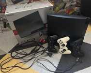 Konsola PS3 Slim 320GB + 3 pady + okablowanie i 9 gier