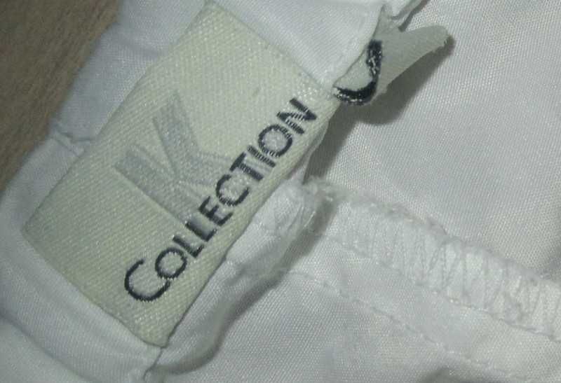 K Collection białe spodnie rozm XXXL 46 / 18