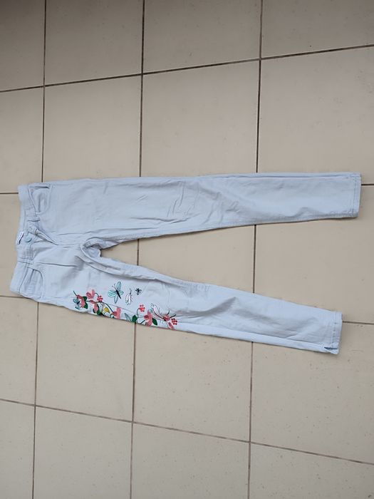 Spodnie jeansy Reserved handmade z wzorem kwiatowym bdb 152