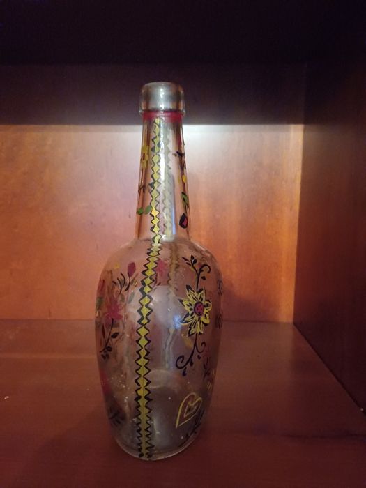 Garrafa de vidro antiga pintada à mão