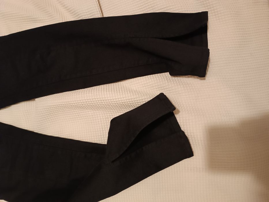 Spodnie jeansowe jeansy z rozcięciami rozcięcia r. 40 Massimo Dutti