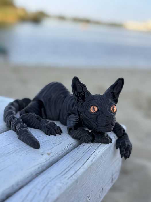 Рухомі фігурки котів сфінксів з 3D-принтера