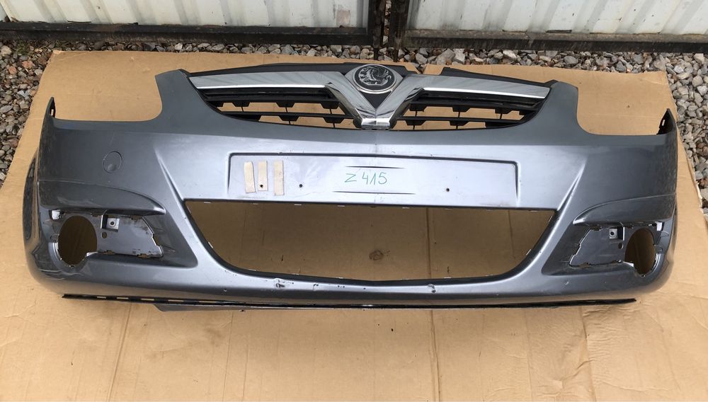 Бампер передній з решіткою радіатора Opel Corsa D 06-10р.