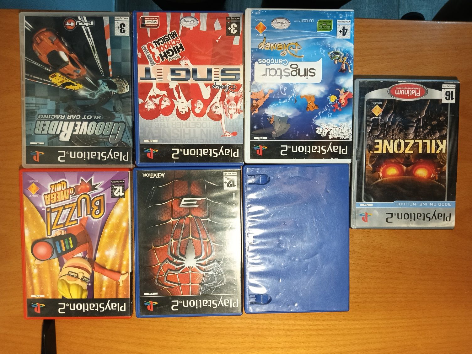 PlayStation 2 + comando original + memory card + 7 jogos (ótimo estado