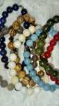 Pulseiras de pedras preciosas com cruz em prata