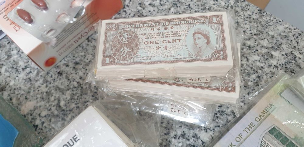 Notas hongkong de 1cent em paquetes de 100