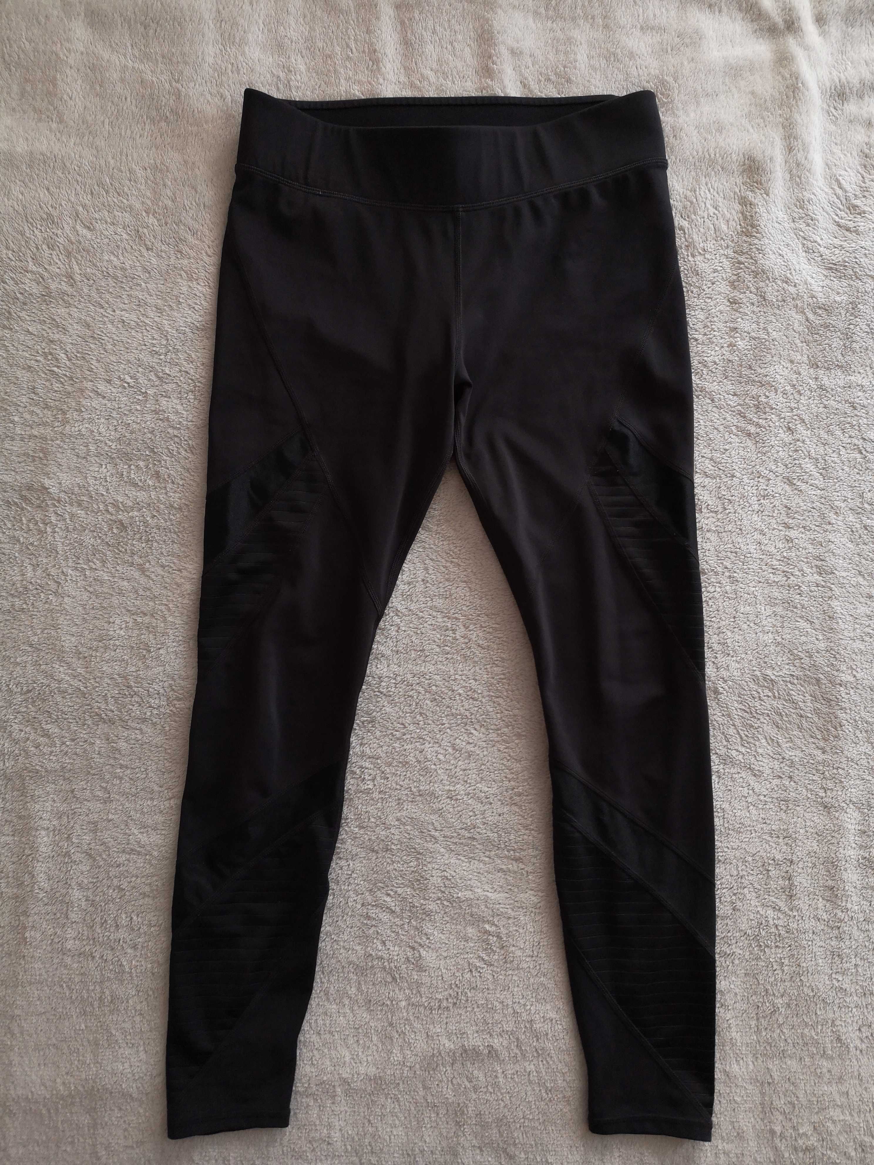 Czarne spodnie legginsy z przeszyciami H&M 38 jak nowe