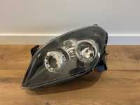 Lampa reflektor Lewy Opel TigraB Twintop Europa czarny, oryginał 04-09