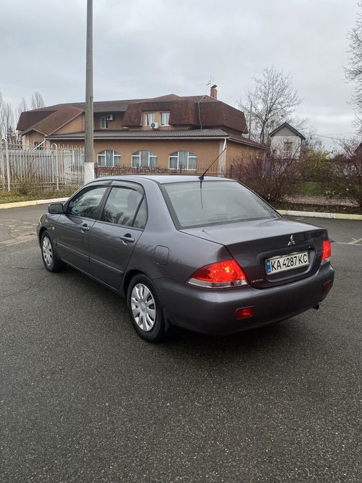 Mitsubishi Lancer 9 1.6 газ4 автомат
