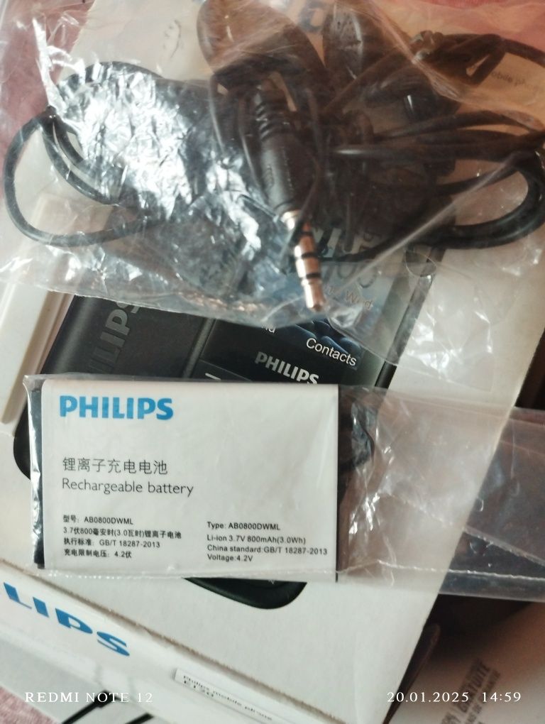 Nowy telefon Philips E120, folia , pudełko, słuchawki ,nowa bateria